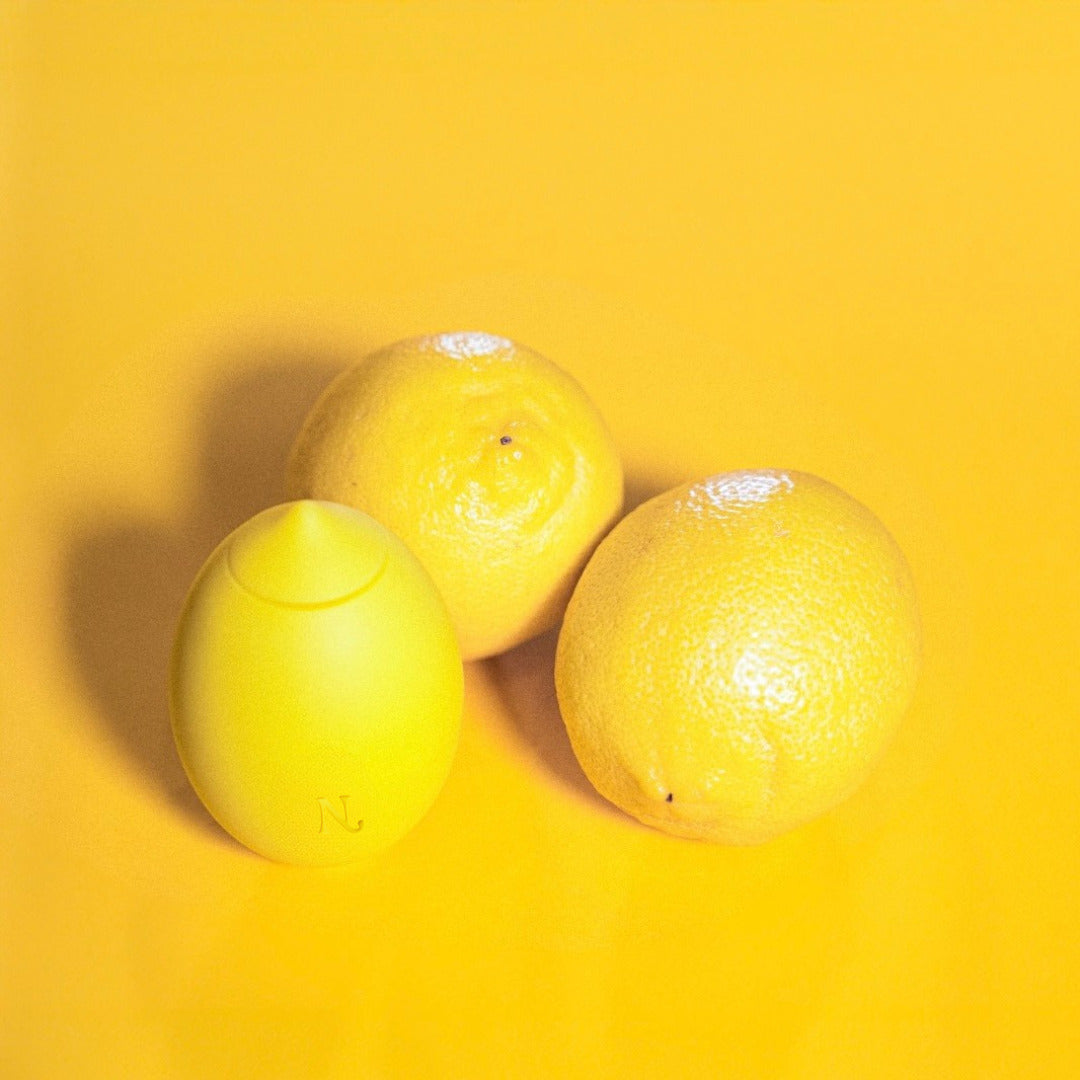 Lem Lemon Clitoral Vibrator — in hand